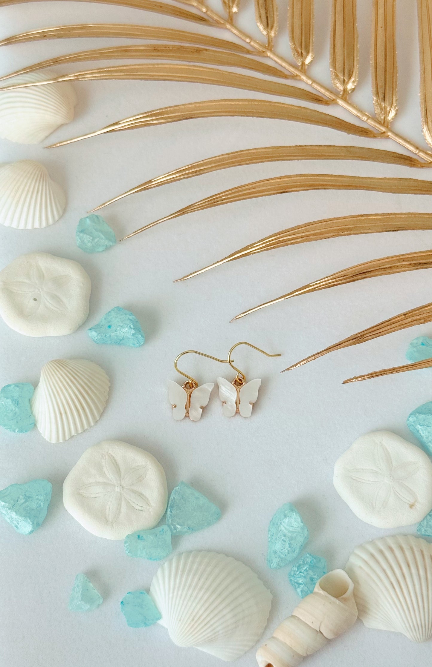 White enamel butterfly dangle earrings