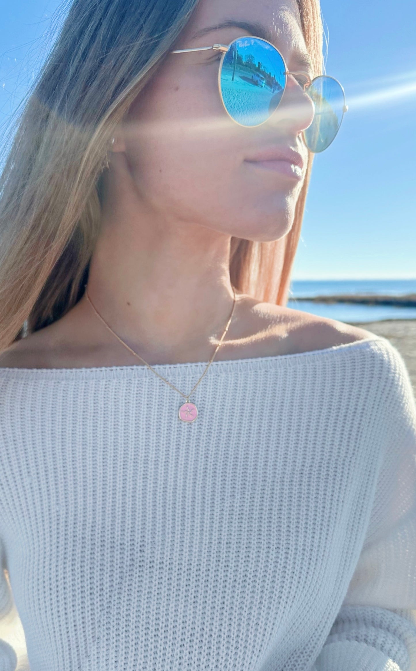 Pink starfish pendant necklace