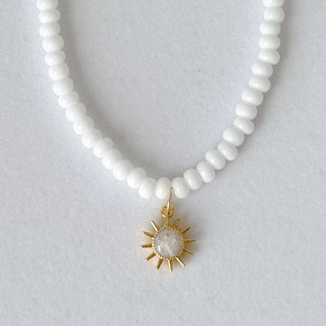 Beaded sun charm necklace