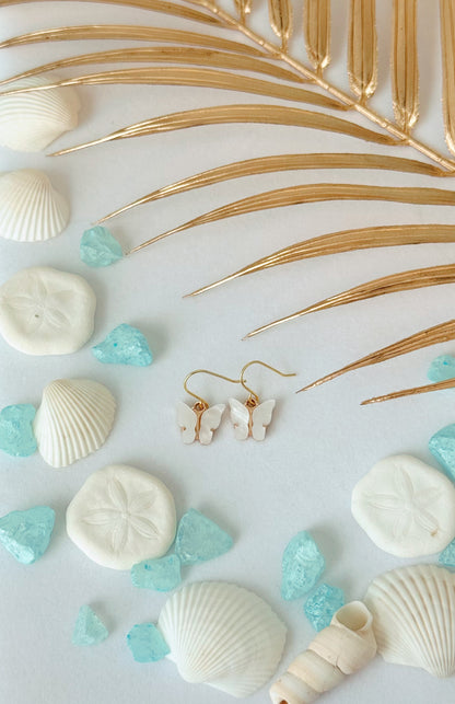 White enamel butterfly dangle earrings