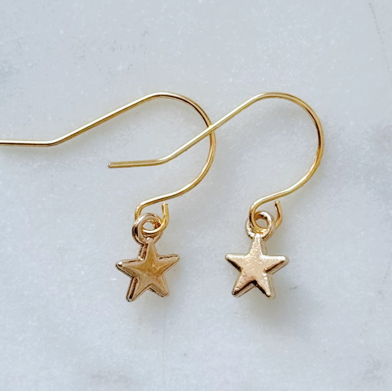 Dainty star earrings