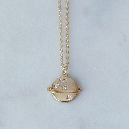 Saturn charm necklace