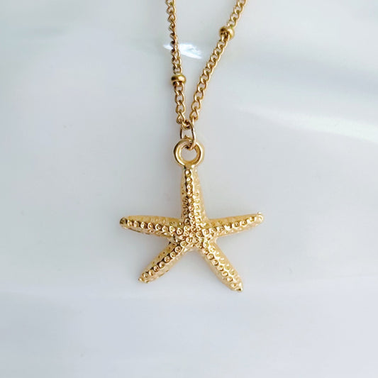 Gold starfish necklace