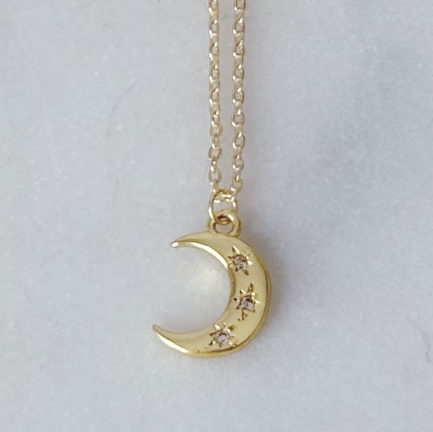 Gold crescent moon necklace