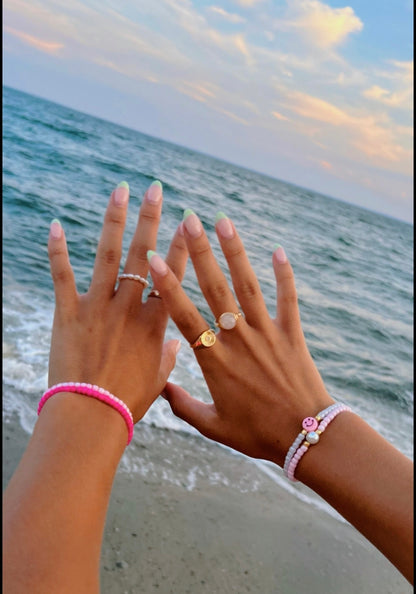 Pink pearl bracelet stack