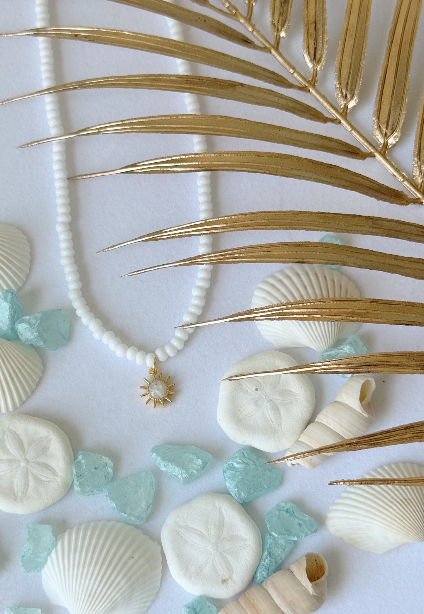 Beaded sun charm necklace