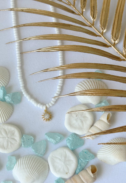 Beaded sun charm necklace