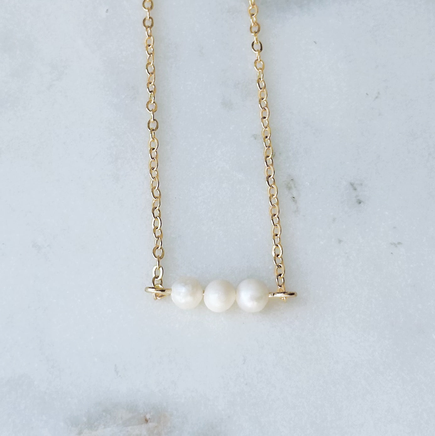 Triple pearl necklace