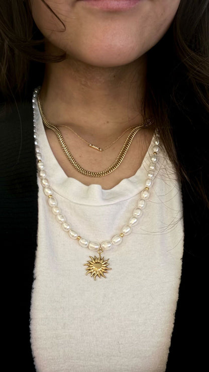 Chunky pearl & gold charm necklace