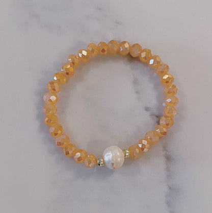 Peach faceted bead and pearl bracelet