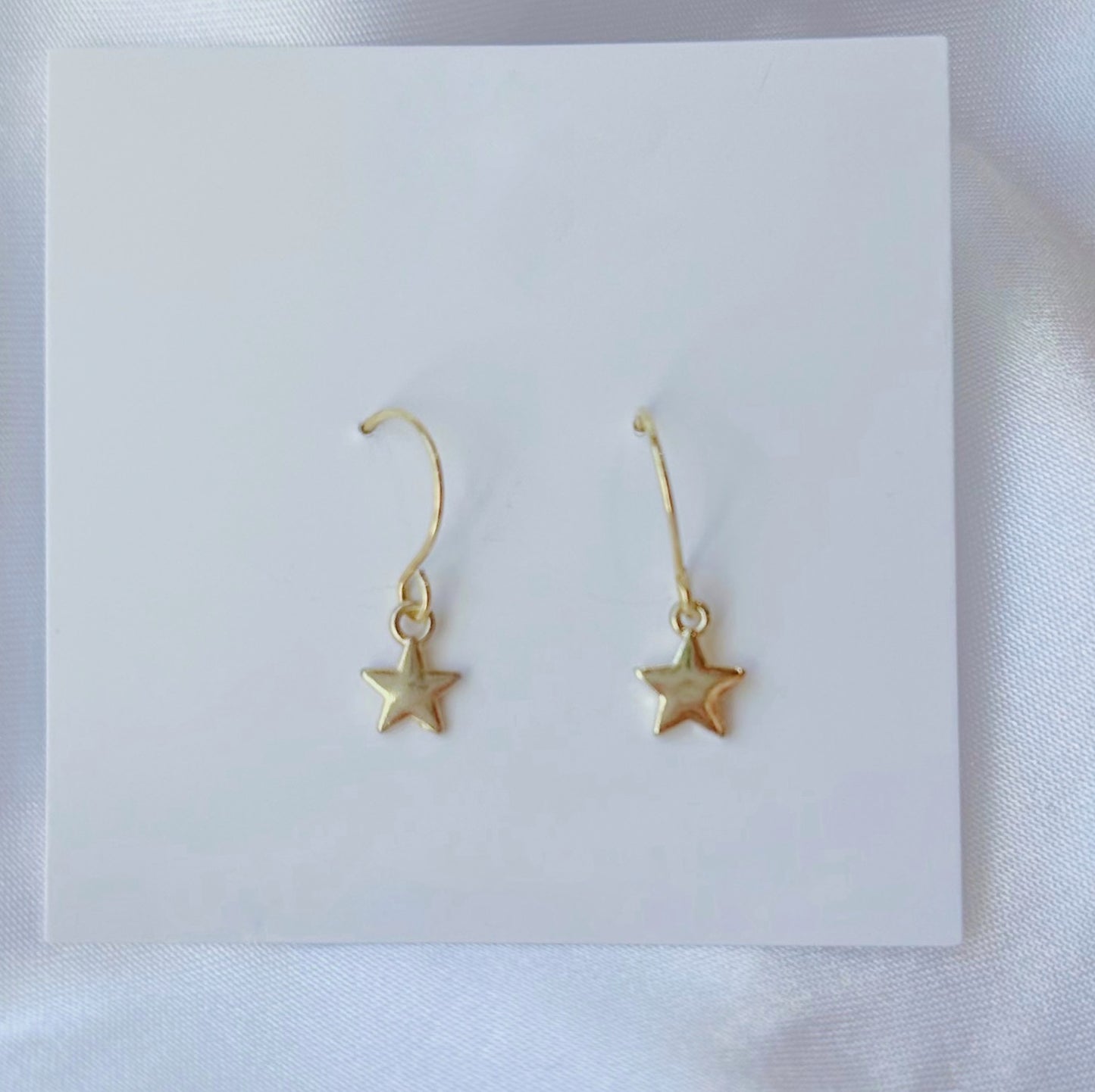 Dainty star earrings