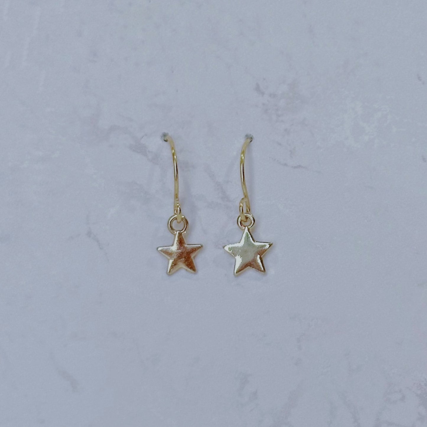 Dainty star earrings