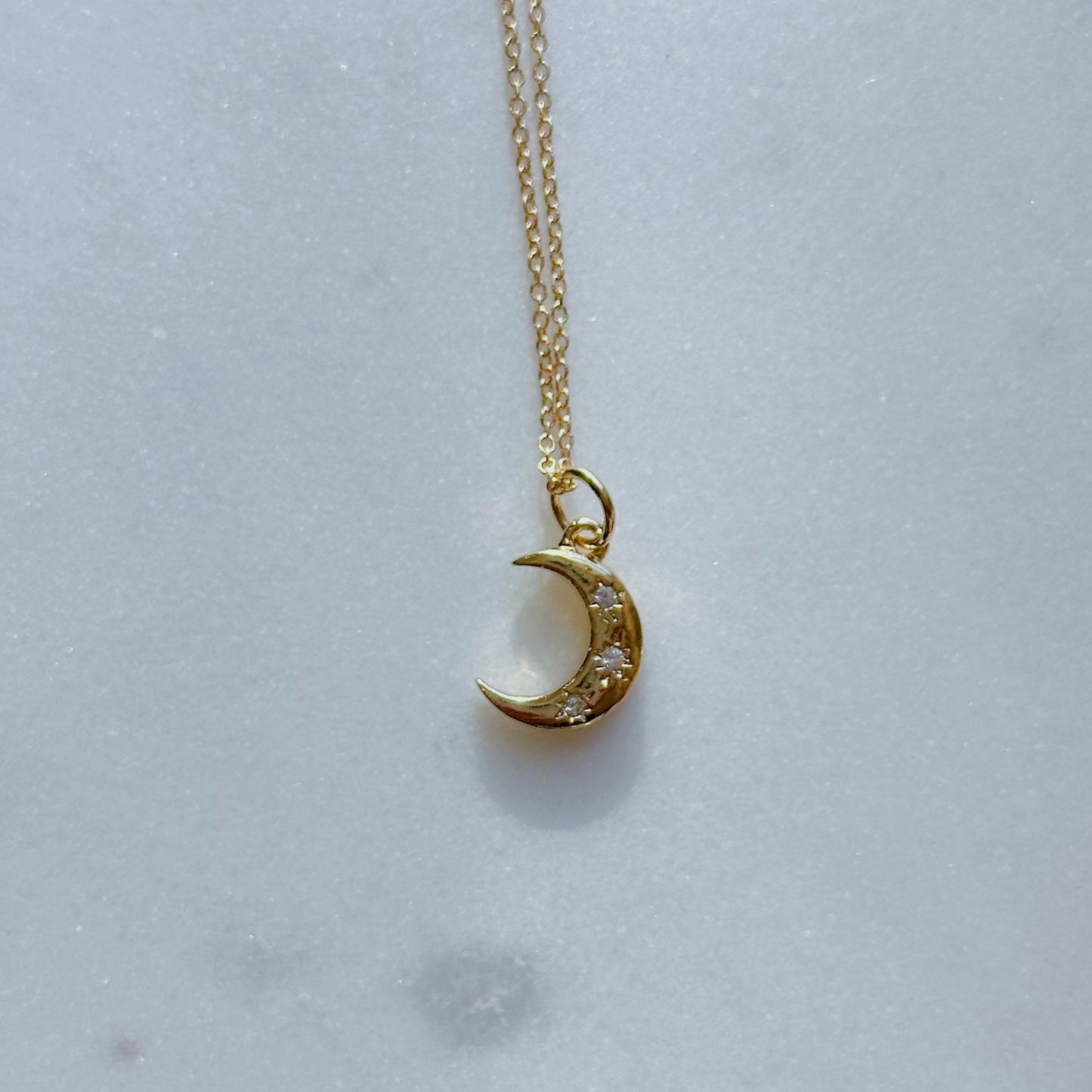 Gold crescent moon necklace