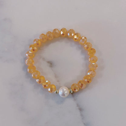 Peach faceted bead and pearl bracelet