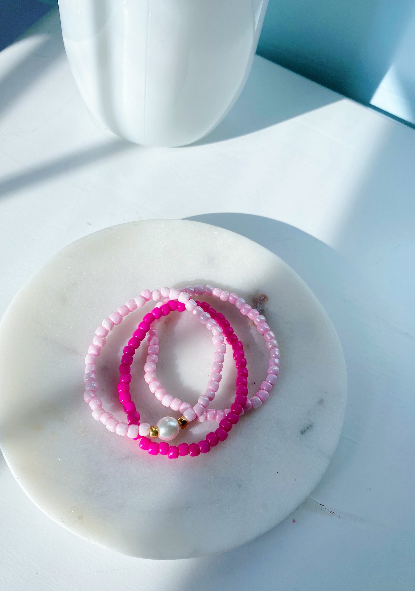 Pink pearl bracelet stack