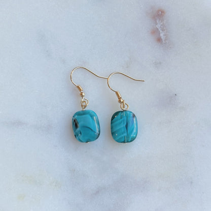 Blue glass swirl dangle earrings