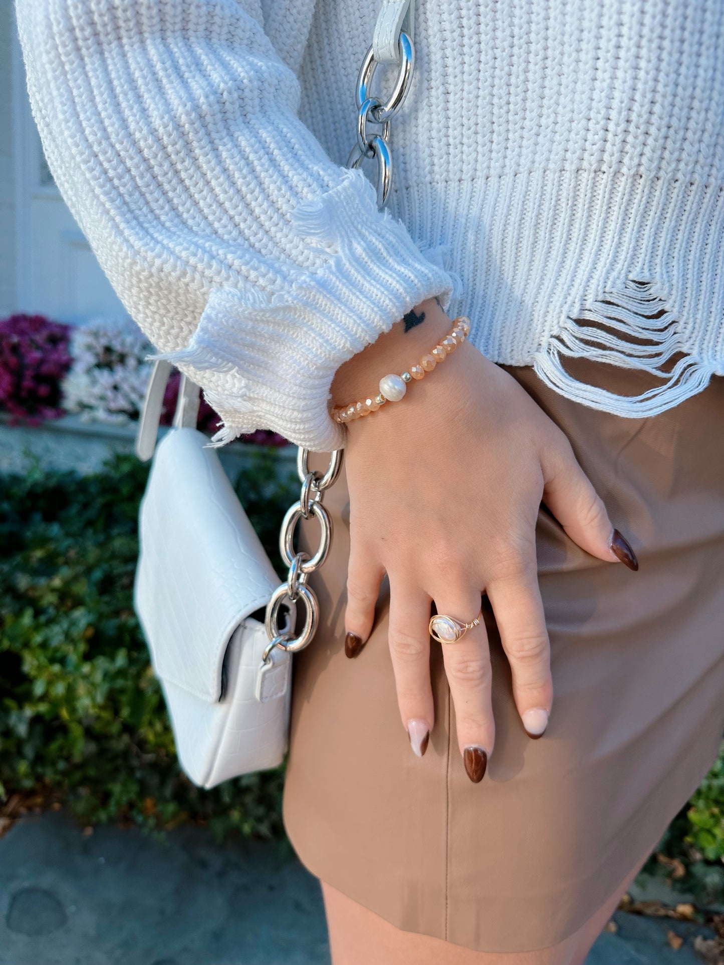 Peach faceted bead and pearl bracelet