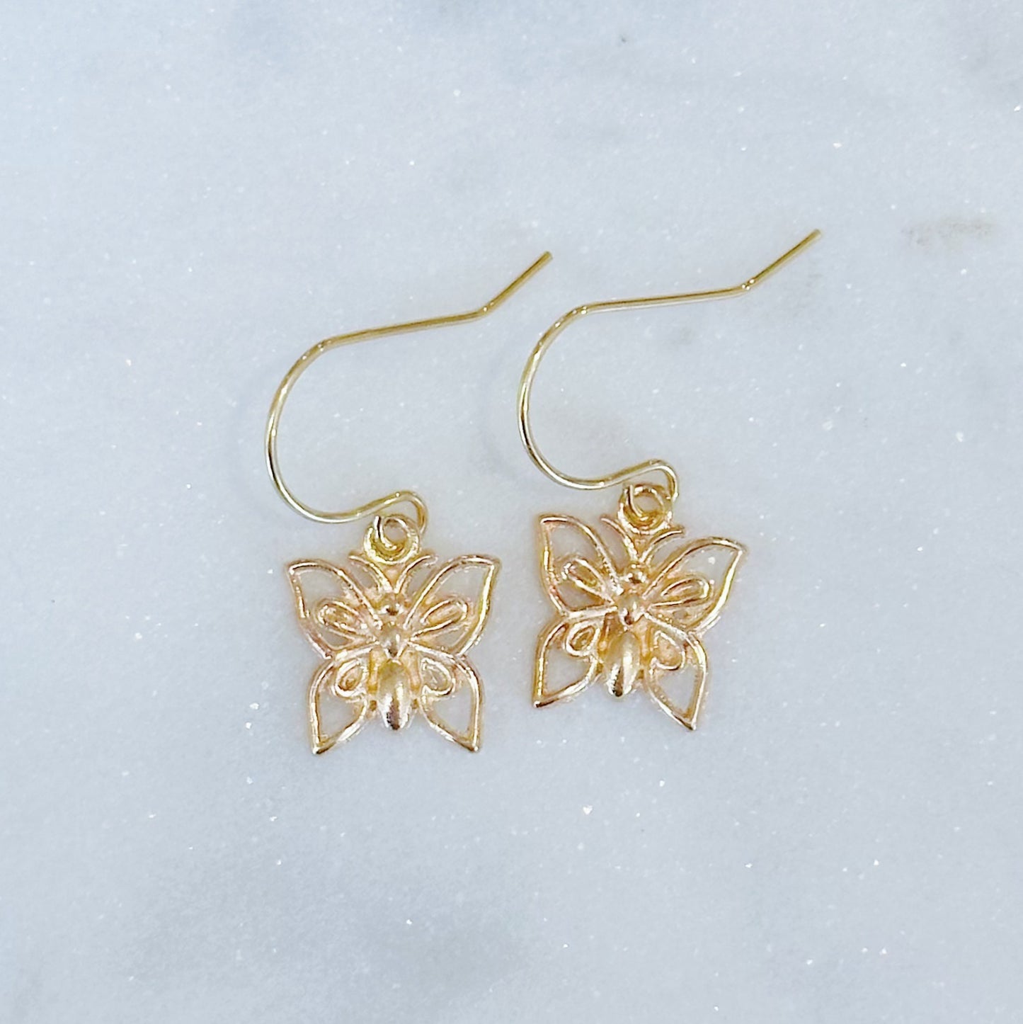 Dainty butterfly charm earrings