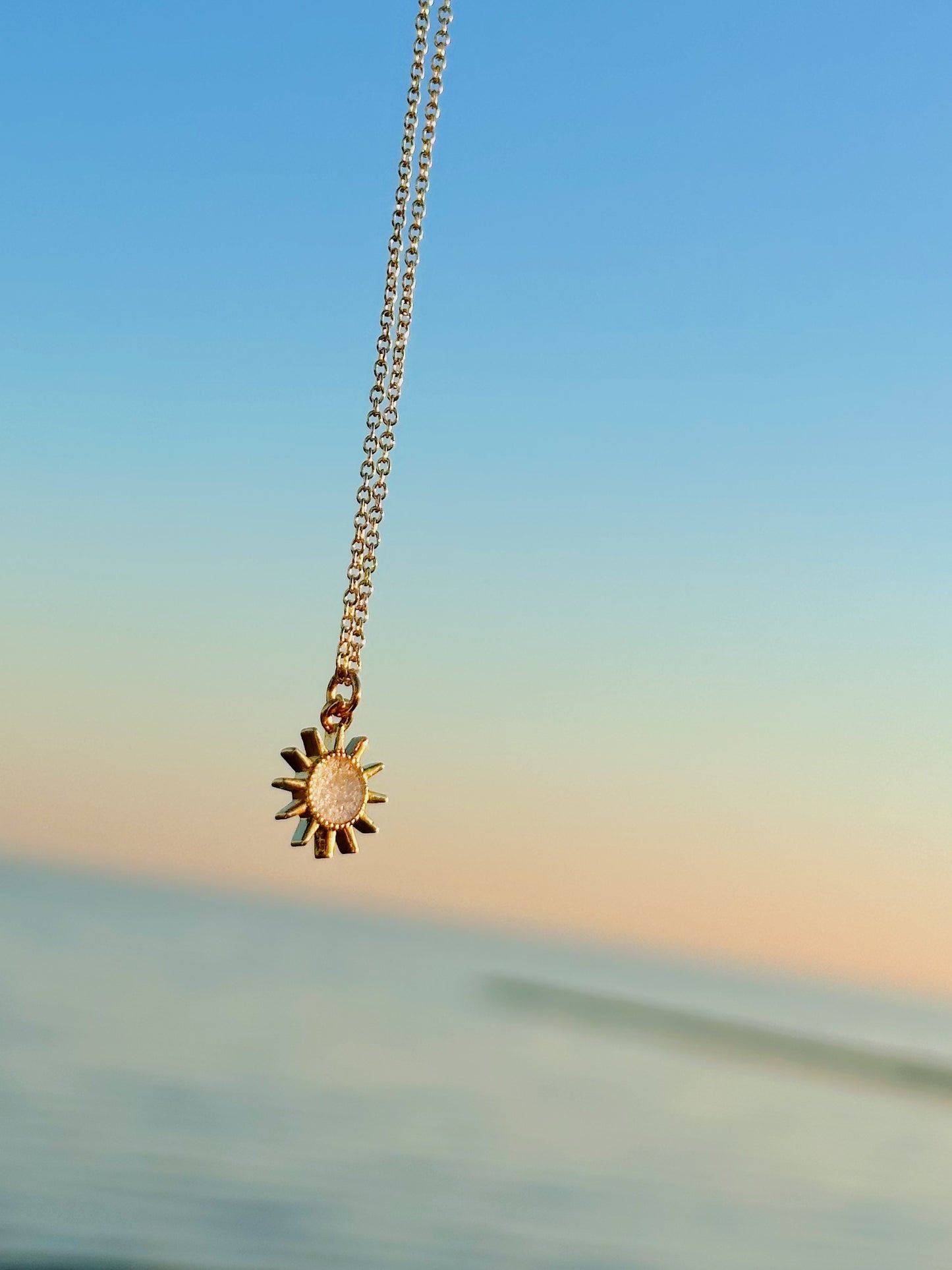 Dainty golden sun necklace