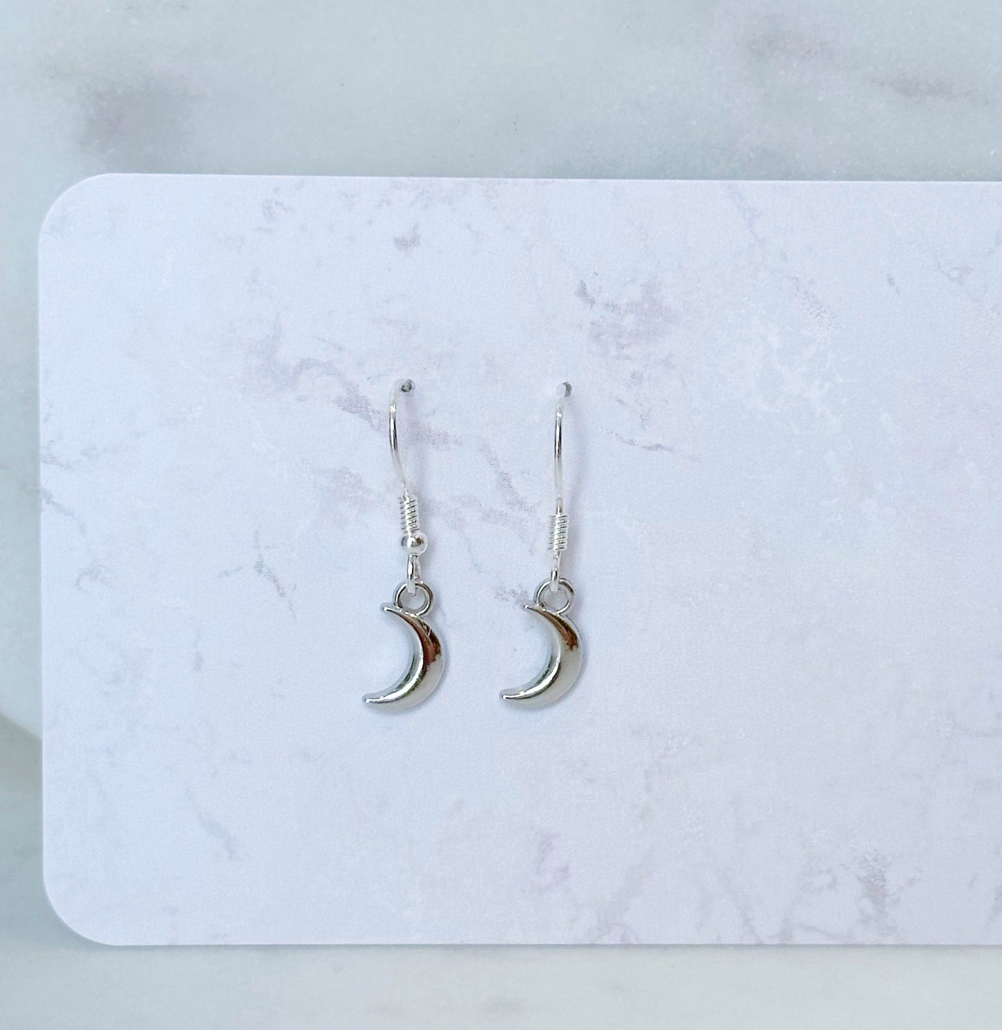 Crescent moon dangle earrings